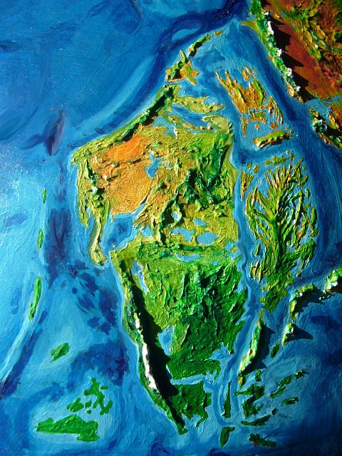 High orbital photo of Filipinia, on Abyssia, an alternate Earth whose relief has been inverted: heights are depths and vice versa.