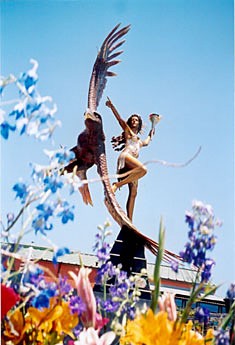 Cheemah, a bronze statue in Jack London Square, Oakland, California. Woman holding a torch stands on the back of a flying eagle.