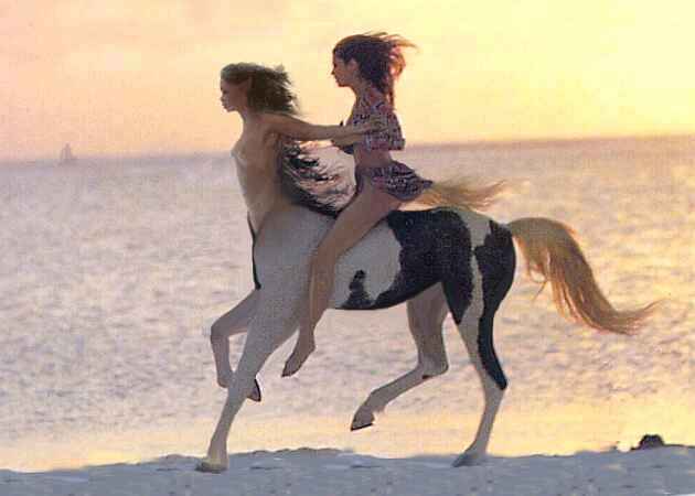 Two sisters of an equine/human mixed-race family gallop on a beach at sunset, one a centaur, one bipedal but tailed. Click to enlarge.
