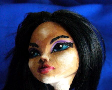 Cleo, a Monster High doll with black Egyptian bangs and kohl-rimmed eyes.