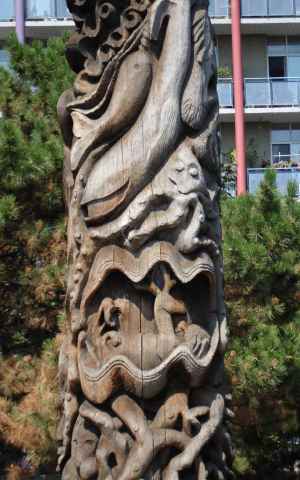 Detail of a dream-inspired totem pole on the Toronto waterfont by Georganna Malloff, showing whales and a deer in a giant clam. Click to enlarge.