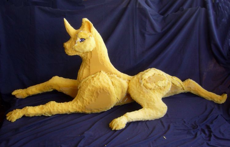 Unicorn carved out of a foam-rubber mattress: dream sculpture by Wayan.