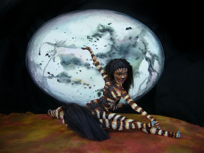 A zebrataur dancer, Aifelle, under a rising moon; drama celebrating fall harvest on Kakalea, a model of an Earthlike world full of Australias. Click to enlarge.
