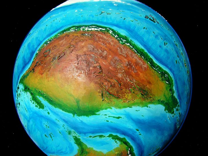 High orbital photo of Ara, a huge desert continent on Kakalea, a model of an Earthlike world full of Australias.