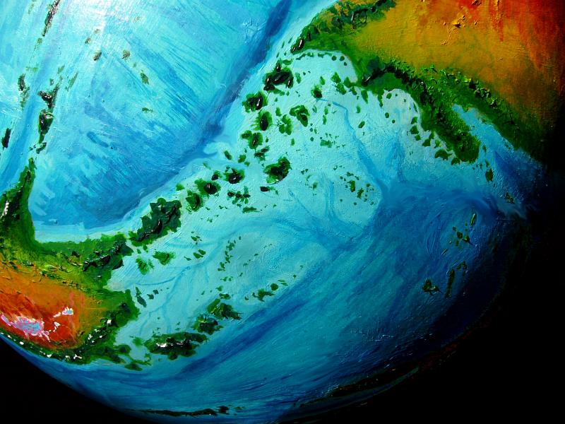 Orbital photo of the Loiba Archipelago between Ara upper right) and East Ata (lower left) on Kakalea, an unlucky Earthlike world: blue seas, red dry continents.
