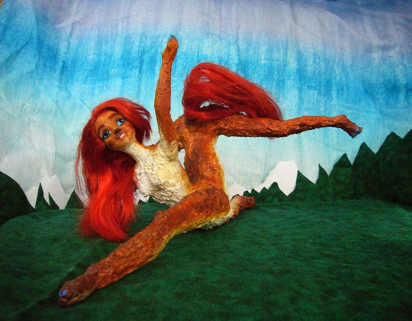 Ariel, a redmaned redtailed centauroid, dances the saga of settlement on the nordic isle of Siba, on Kakalea, a climatically unlucky Earthlike world. Click to enlarge.