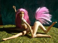 The sculpting of Fuchsia, a centauroid dancer, out of two Barbies; by Chris Wayan. Click to enlarge