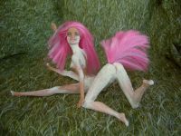 The sculpting of Fuchsia, a centauroid dancer, out of two Barbies; by Chris Wayan. Click to enlarge