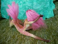 The sculpting of Fuchsia, a centauroid dancer, out of two Barbies; by Chris Wayan. Click to enlarge