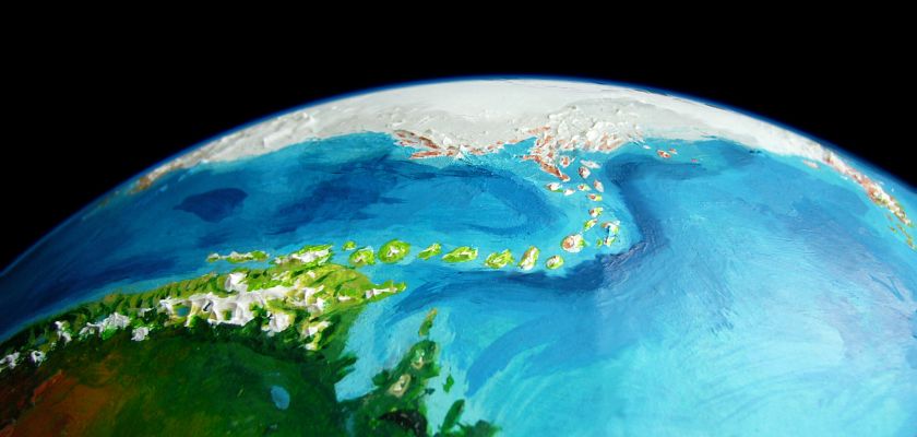 Low orbital photo of southern Bima and the islands linking it to icy Cape Halo on Sia, the antarctic continent on Kakalea, a model of an Earthlike world with a desert problem.