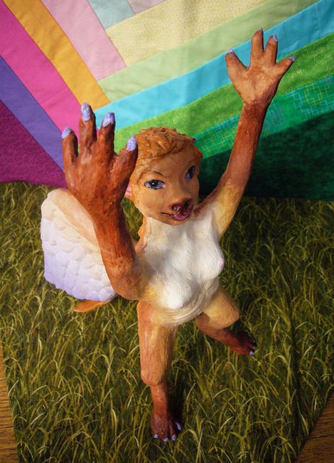 Painted clay statue, 'Lebbird Ecstatic'; face and arms raised. Click to enlarge.