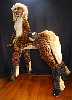 Lifesize cat-taur with jointed wood bones, dense foam muscles, fake-fur pelt; paws unfinished. Dream figure by Chris Wayan. Click to enlarge.