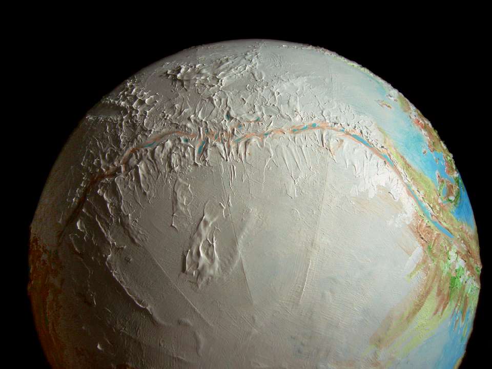 Orbital photo of the southern rift/thermal zone, a nearly ice-free valley crossing the nightside of Libratia, a tidelocked world.