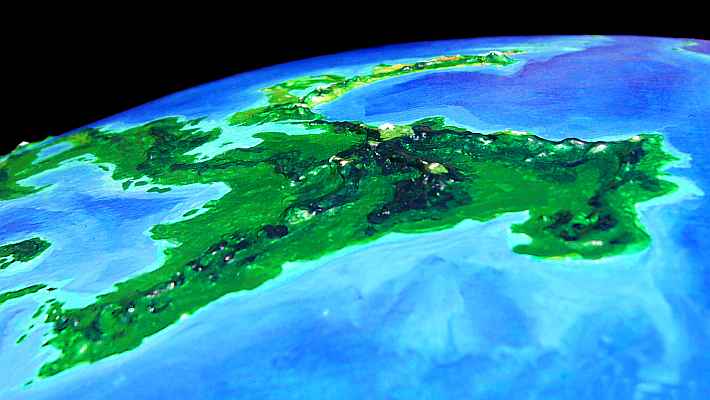 Low orbital photo looking north at Lannach, a rainforested continent on Lyr, a model of a huge sea-world. Click to enlarge.