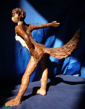 Wolf-girl gesturing; freestanding dream sculpture by Wayan. Click to enlarge.