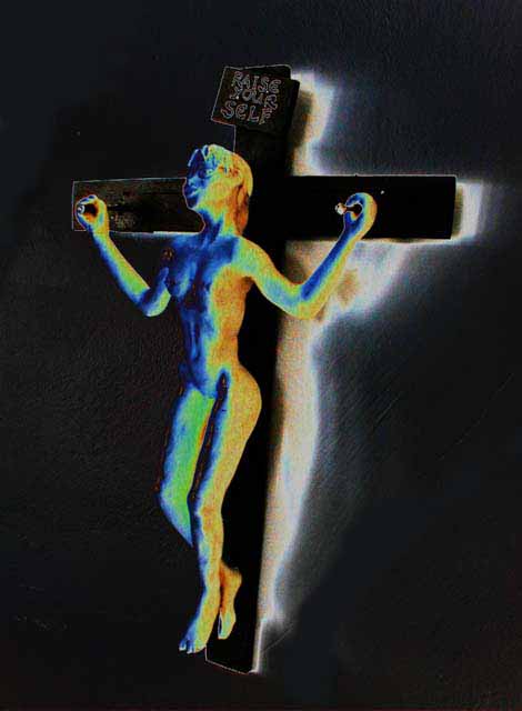 Negative, solarized image of girl on a cross raising herself