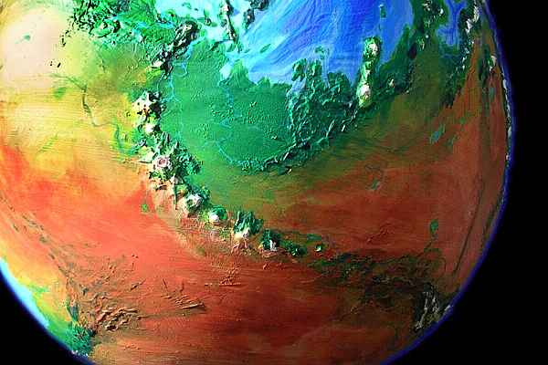 Orbital photo of the Tsud Desert and Woble Tholi in southern Serrana, an experimental biosphere with Martian characteristics.  Click to enlarge.