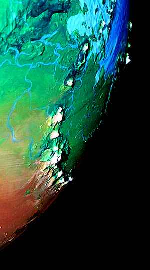 Orbital photo of the Woble Mts, a chain of near-Martian volcanoes, on Serrana, a small dry planet.