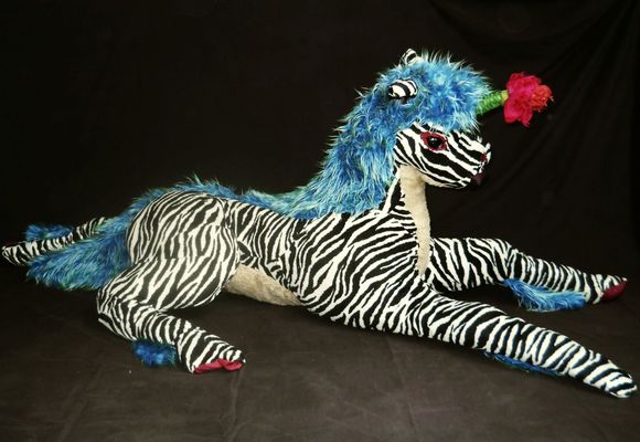 'Five-Heart Unicorn, a soft sculpture about 180 cm long, based on a dream, by Chris Wayan; click to enlarge.