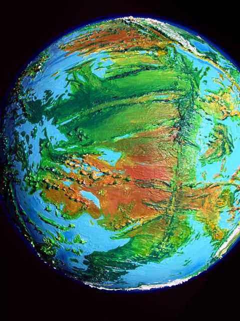 A high orbital photo of the East Pacific Ridge on Siphonia, a study of the Earth with 90% of its water drained away: a belt of equatorial forest, two huge deserts, and a long temperate forested tail to the southeast, toward New Zealand. Click to enlarge