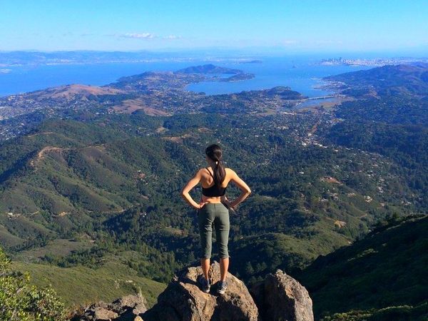 Hiker near summit of Mt Tamalpais; San Francisco in background. Photographer unknown. Click to enlarge.