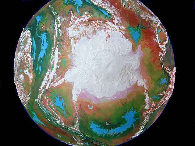 Orbital photo of the north polar cap and surrounding tundras and deserts on Tharn, a dry rather Marslike planet-model.