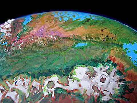 Low orbital photo of the Orovar Range, with Llana Upland, the Shuka Trench and Kantol Sea on the horizon.