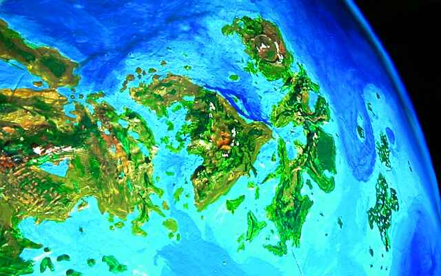 low orbital photo looking east from the continent of Ishtar to the huge islands of Tethus and Meskhent, on Venus, after terraforming. Click to enlarge.