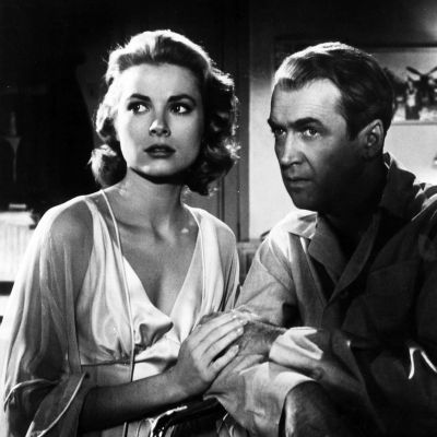 Grace Kelly and Jimmy Stewart in Hitchcock's REAR WINDOW.